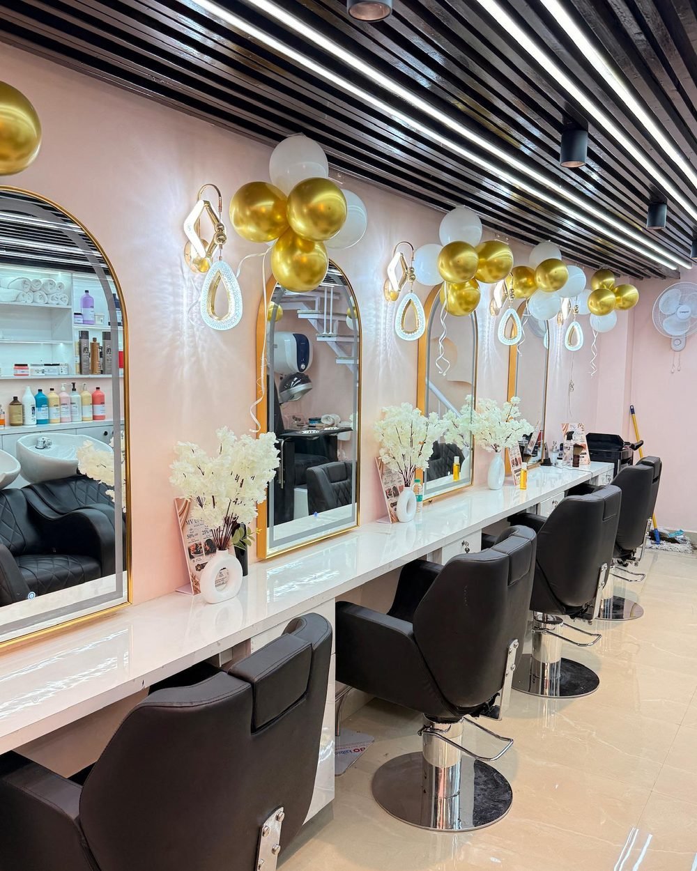 Interior of Magnify By Varsha unisex salon in Gurugram, showing styling stations and mirrors
